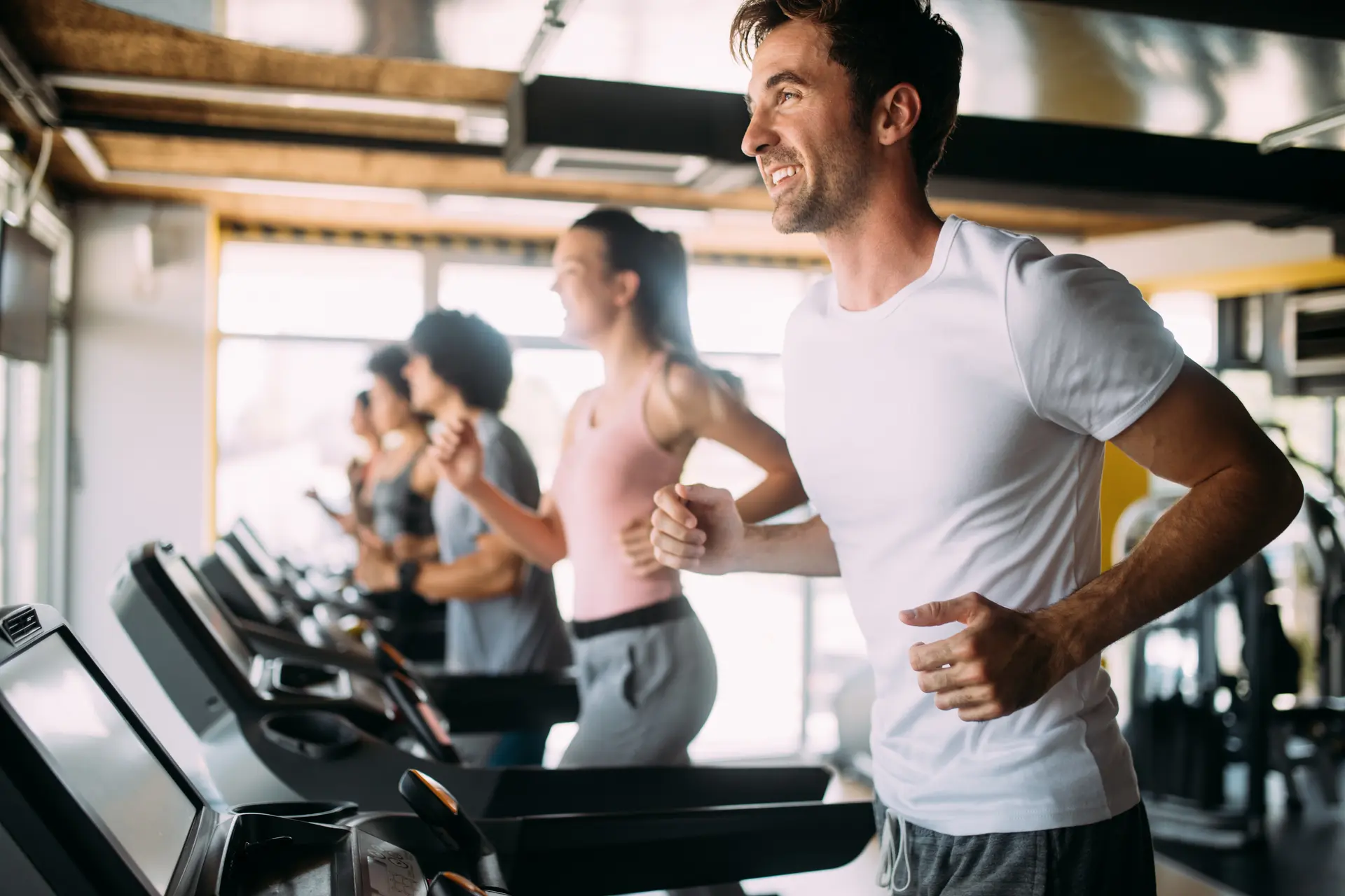 Group of sportive people in a gym.